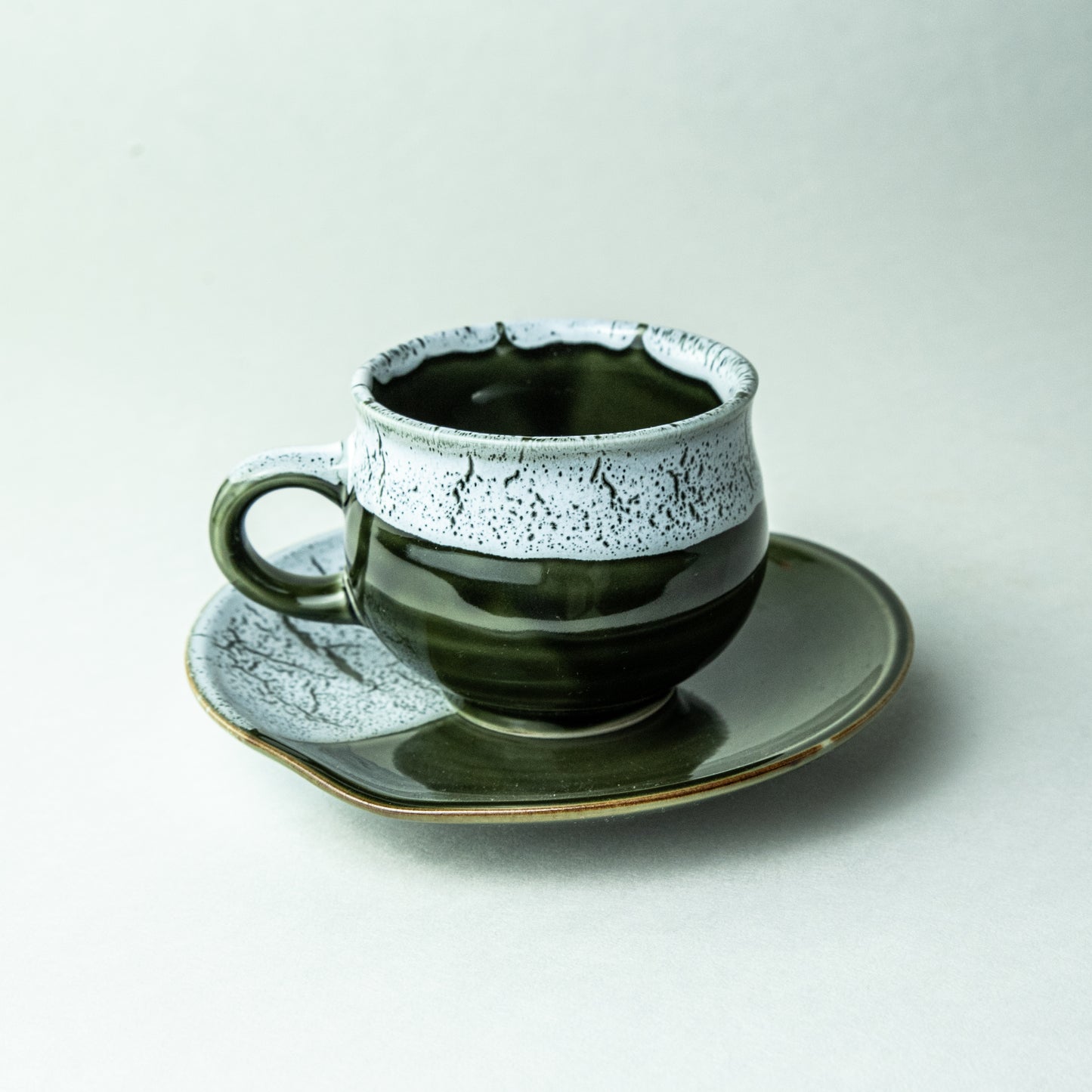 ANGLE Mino ware dipped stained glass cup and saucer, green
