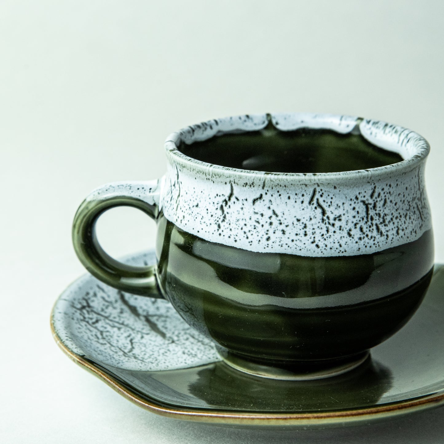 ANGLE Mino ware dipped stained glass cup and saucer, green