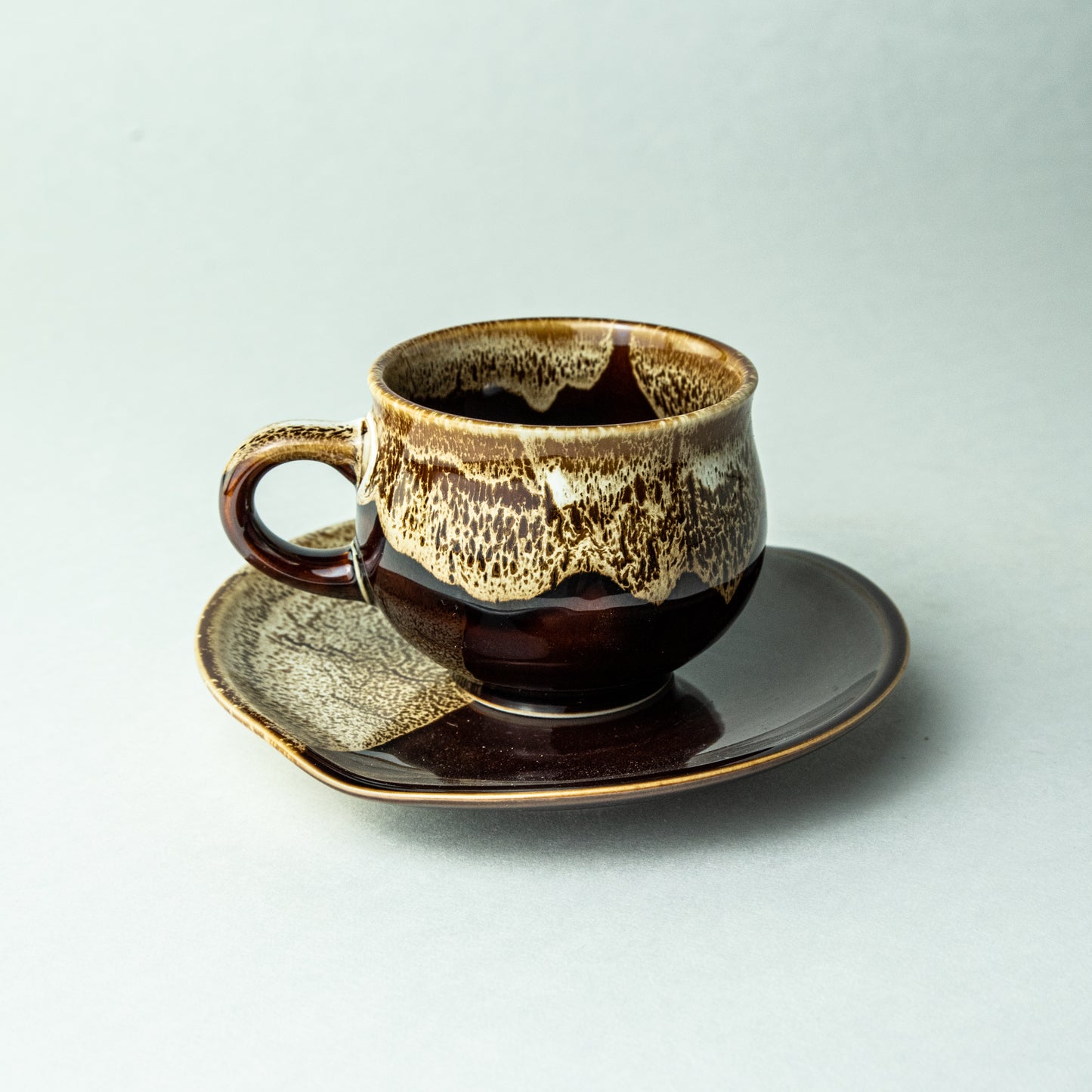 ANGLE Mino ware dipped stained glass cup and saucer, brown