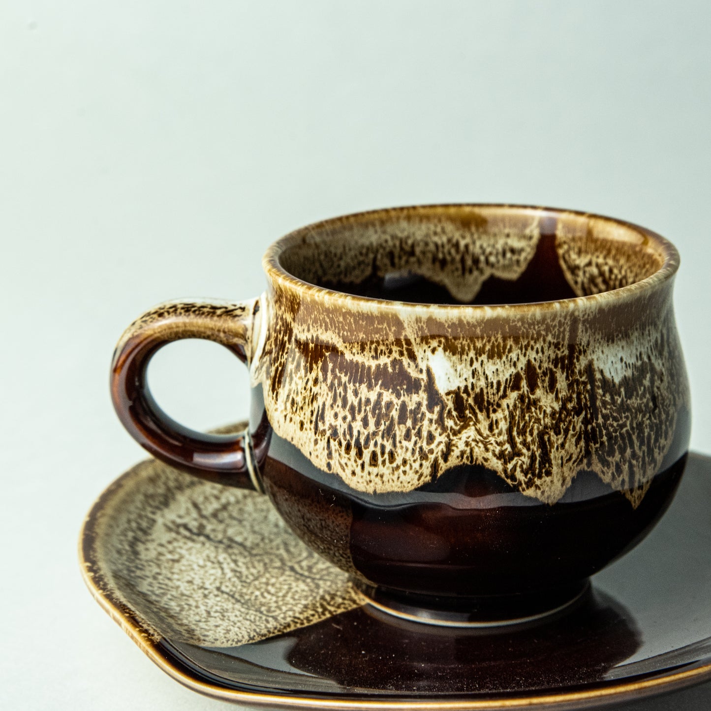 ANGLE Mino ware dipped stained glass cup and saucer, brown